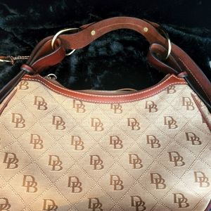 Dooney & Bourke Tan Canvas Signature Circular Hobo Bag.